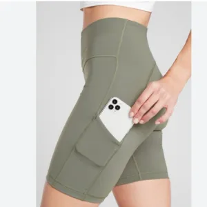 NWT Athleta Ultimate Stash Pocket 7&quot; Short in Laurel Olive Green Size M $60
