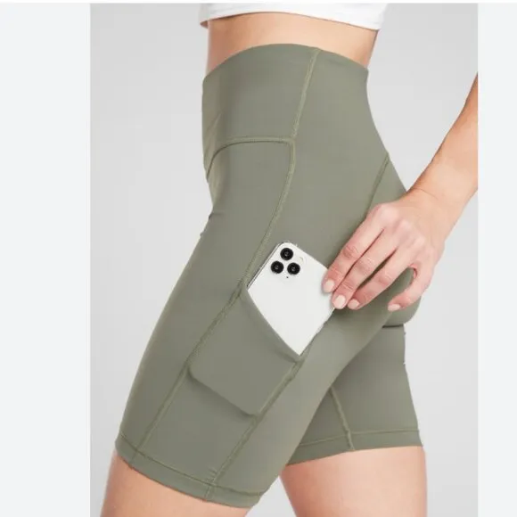 NWT Athleta Ultimate Stash Pocket 7&quot; Short in Laurel Olive Green Size M $60